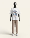 Woman wearing a white cotton tee with a watercolour mother and child print and SUPER MOM lettering
