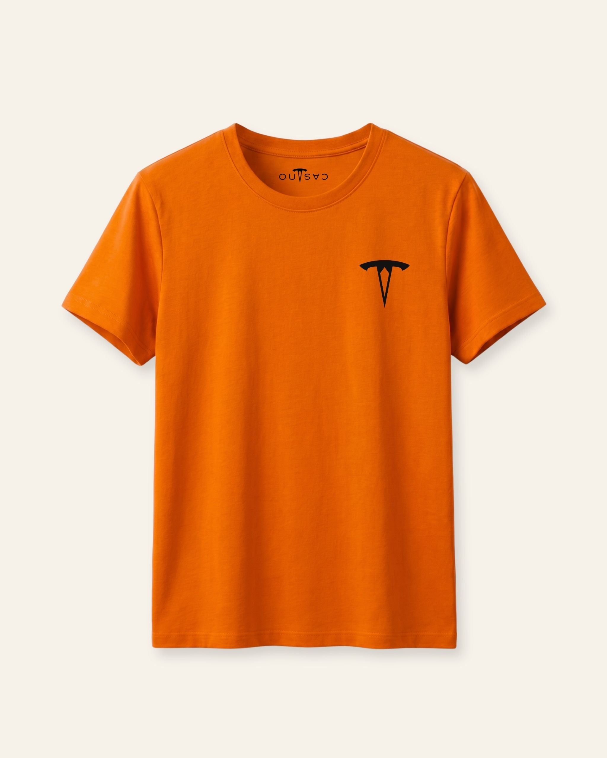 Kids orange basic tee with a black OUTCAST logo, flat front