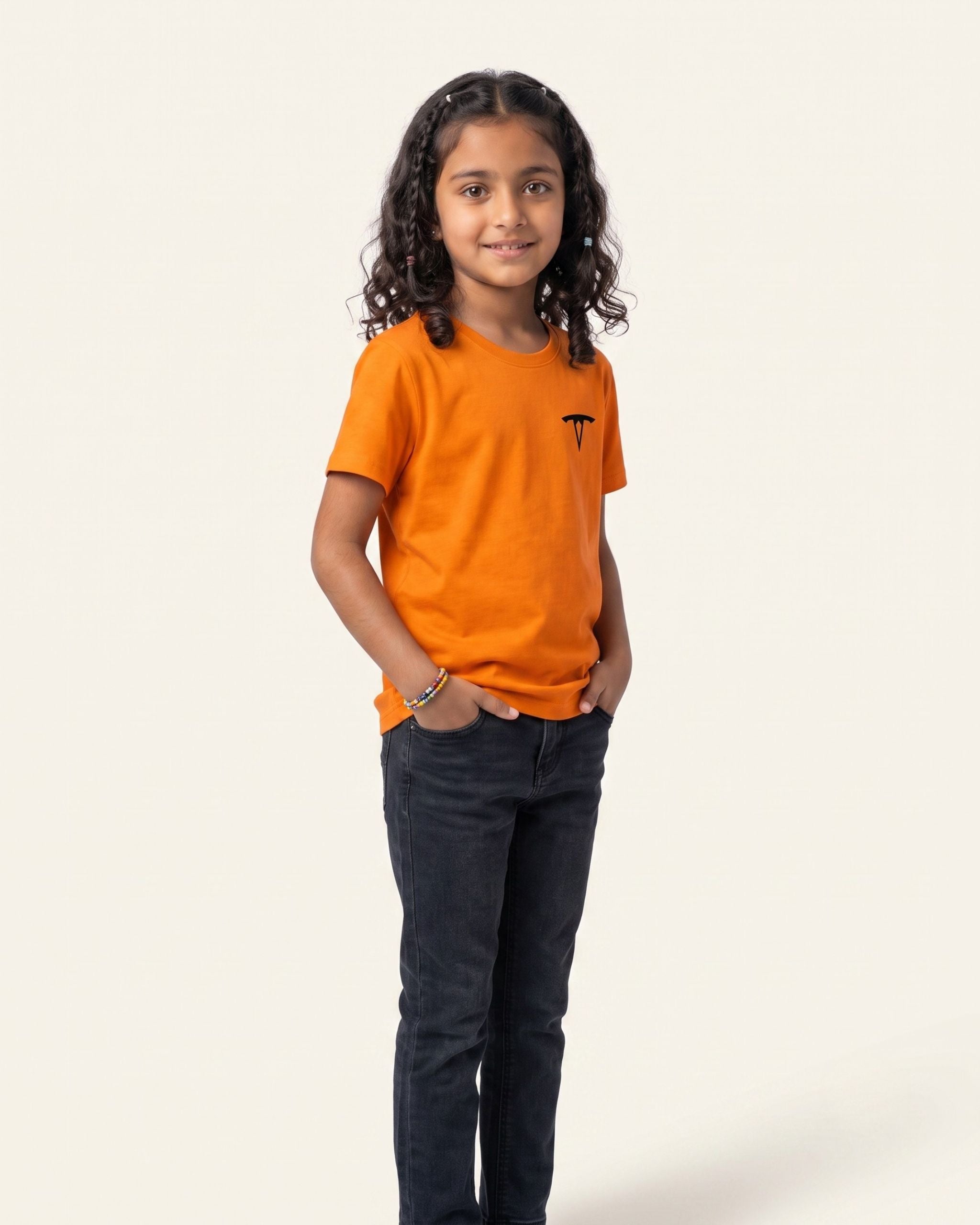 Girl wearing an orange OUTCAST basic tee