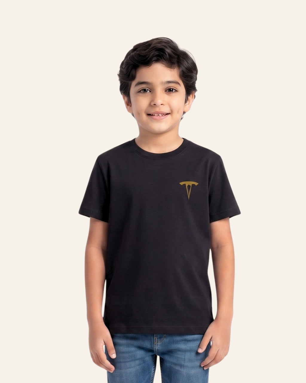Boy wearing a black OUTCAST basic tee with jeans