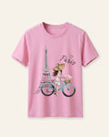 Pink kids cotton tee with a line-drawn Eiffel Tower and flower cart print