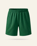 Kids green shorts with an elastic waist, flat front
