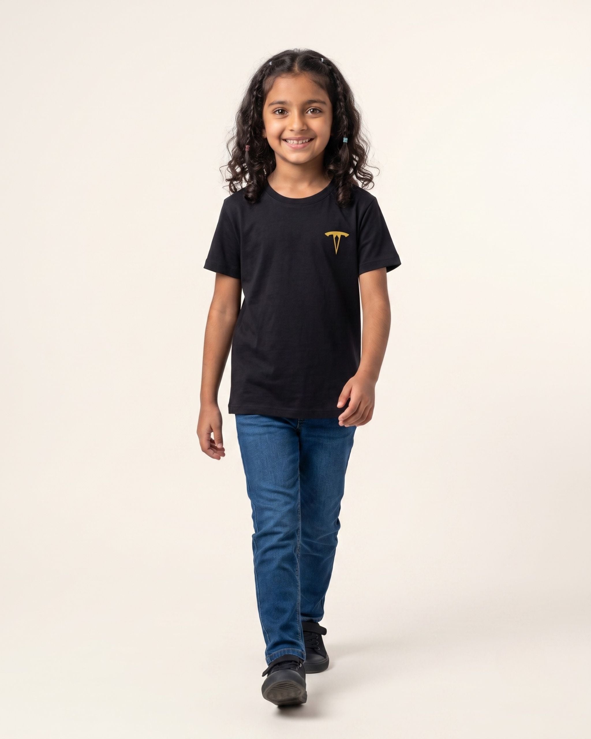 Girl wearing a black OUTCAST basic tee with jeans