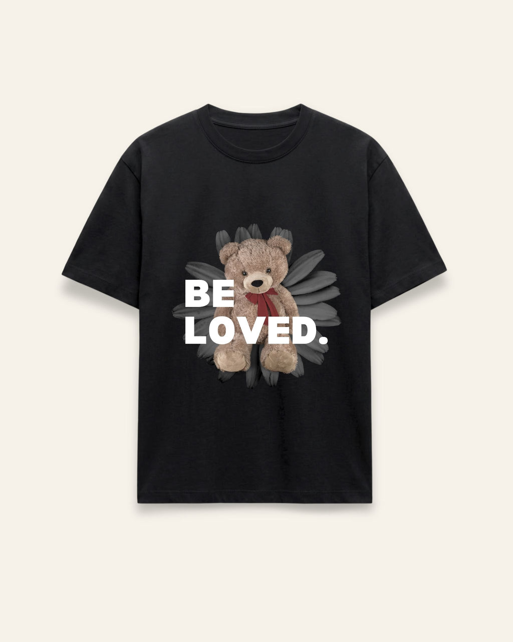 Front of the black cotton tee with a teddy bear peeking behind a bold BE LOVED wordmark