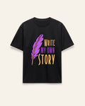Front of the black cotton tee with a purple quill pen and hand-lettered WRITE MY OWN STORY