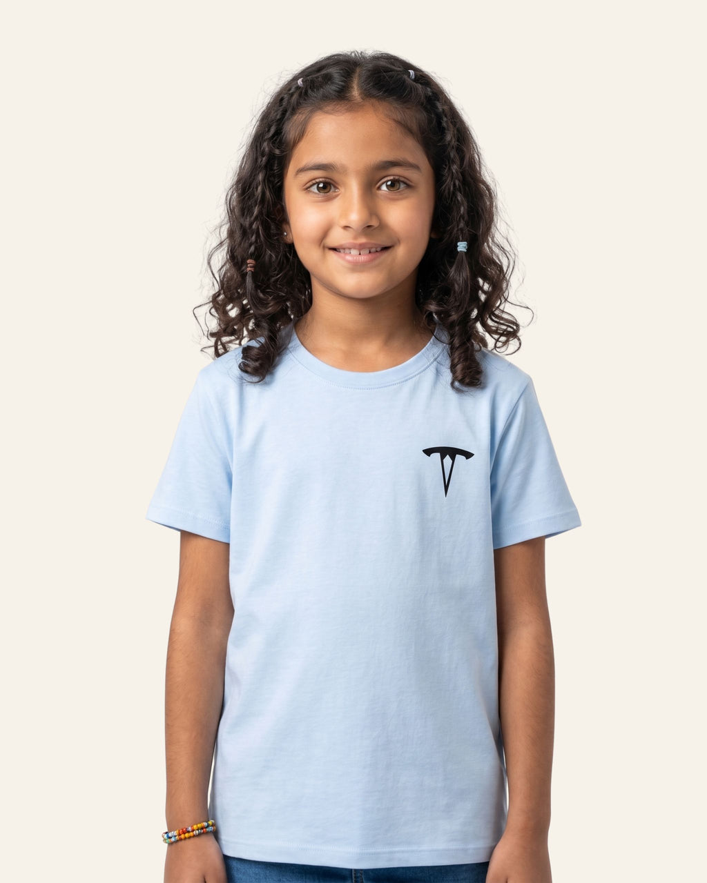 Girl wearing a sky blue OUTCAST basic tee with jeans