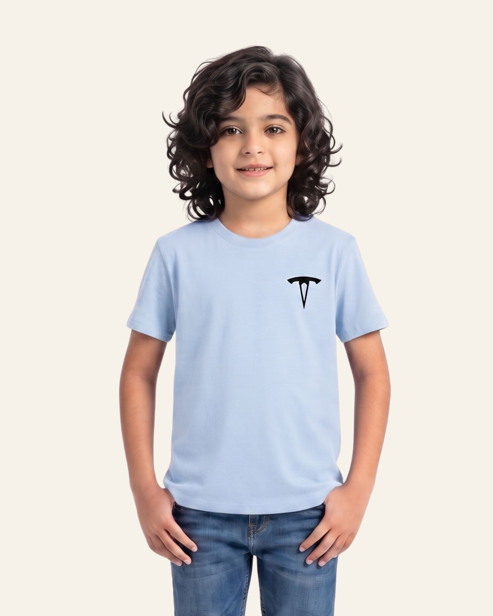 Boy wearing a sky blue OUTCAST basic tee with jeans