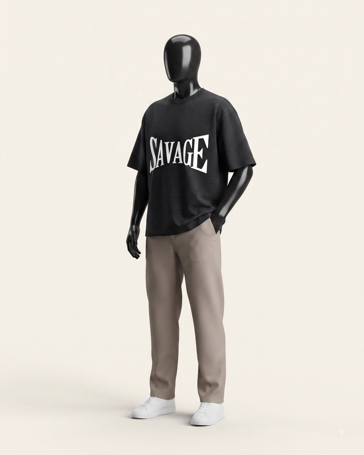 Man wearing a black cotton tee with a rough carved SAVAGE wordmark print
