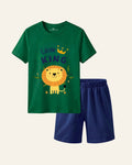Green kids tee with a crowned lion print and matching navy shorts