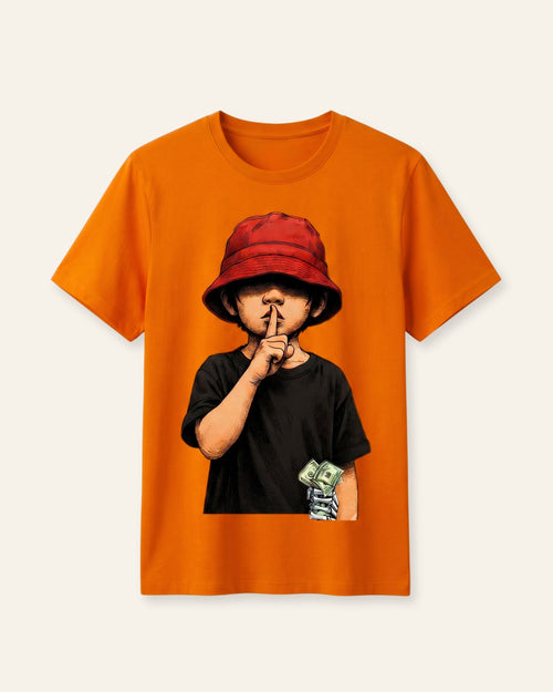 Boys orange tee with cool cartoon kid in a bucket hat with a playful shush — a bold streetwear-style print, ages 3-14