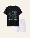 Black kids tee with a neon astronaut and rocket print and matching white shorts