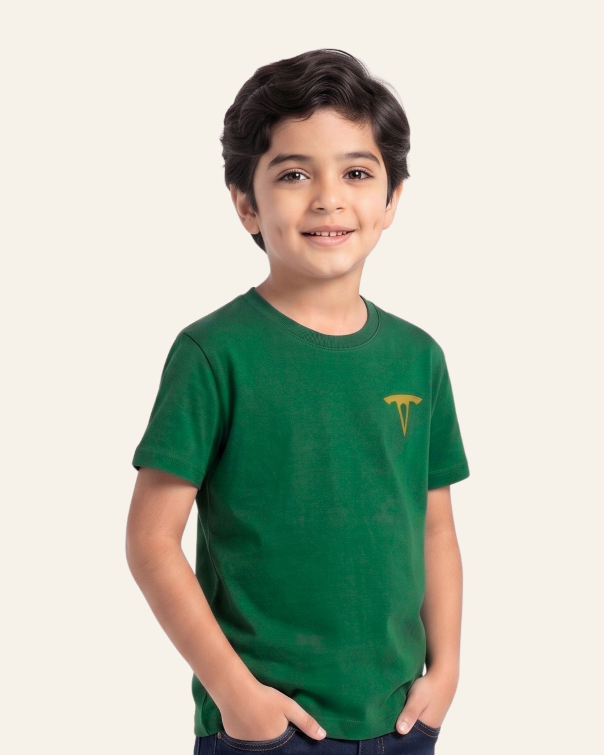 Boy wearing a green OUTCAST basic tee