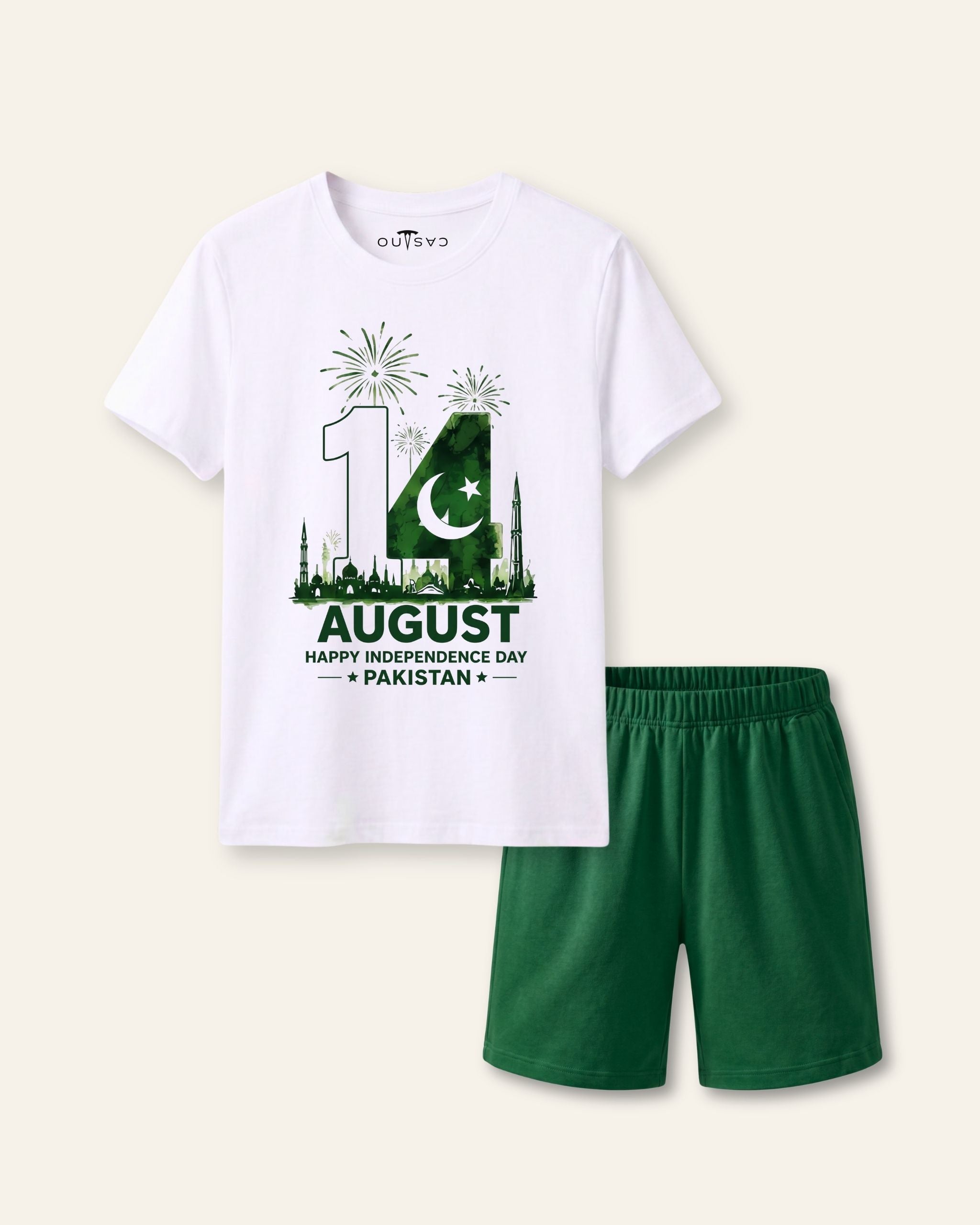 Kids white tee with Minar-e-Pakistan under a sunrise and a 14 August line and green shorts