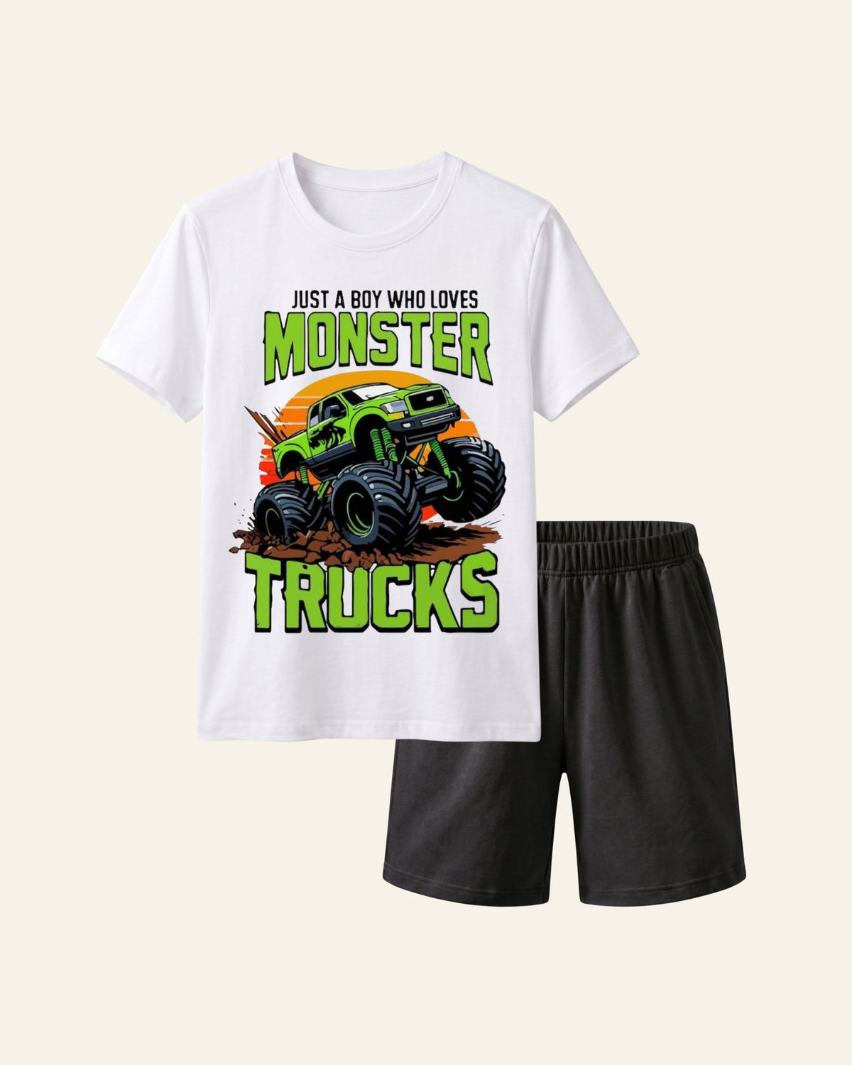 White kids tee with a monster trucks print and matching dark shorts