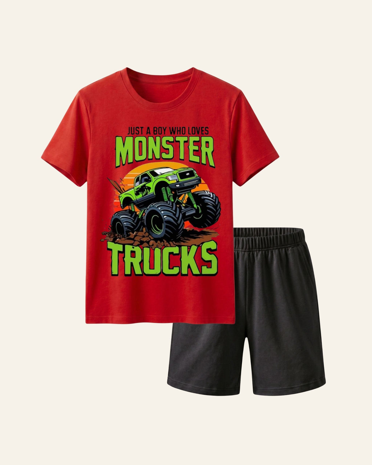 Red kids tee with a monster trucks print and matching dark shorts
