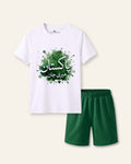 Kids white tee with Pakistan Meri Jaan in Urdu on a green splash and green shorts