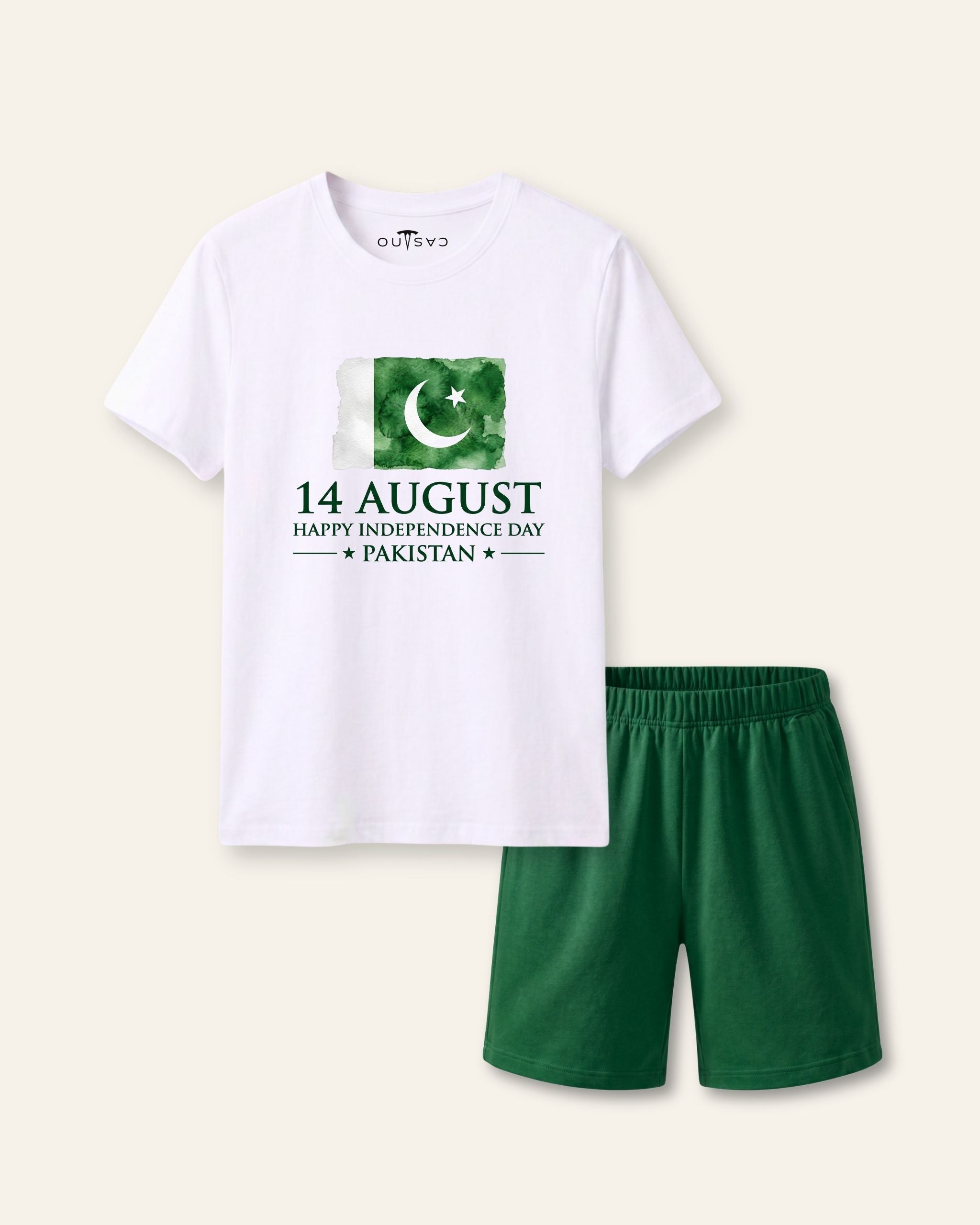 Kids white tee with a corner flag and 14 August print and green shorts
