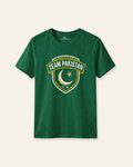 Kids green tee with a round gold crest and crescent print