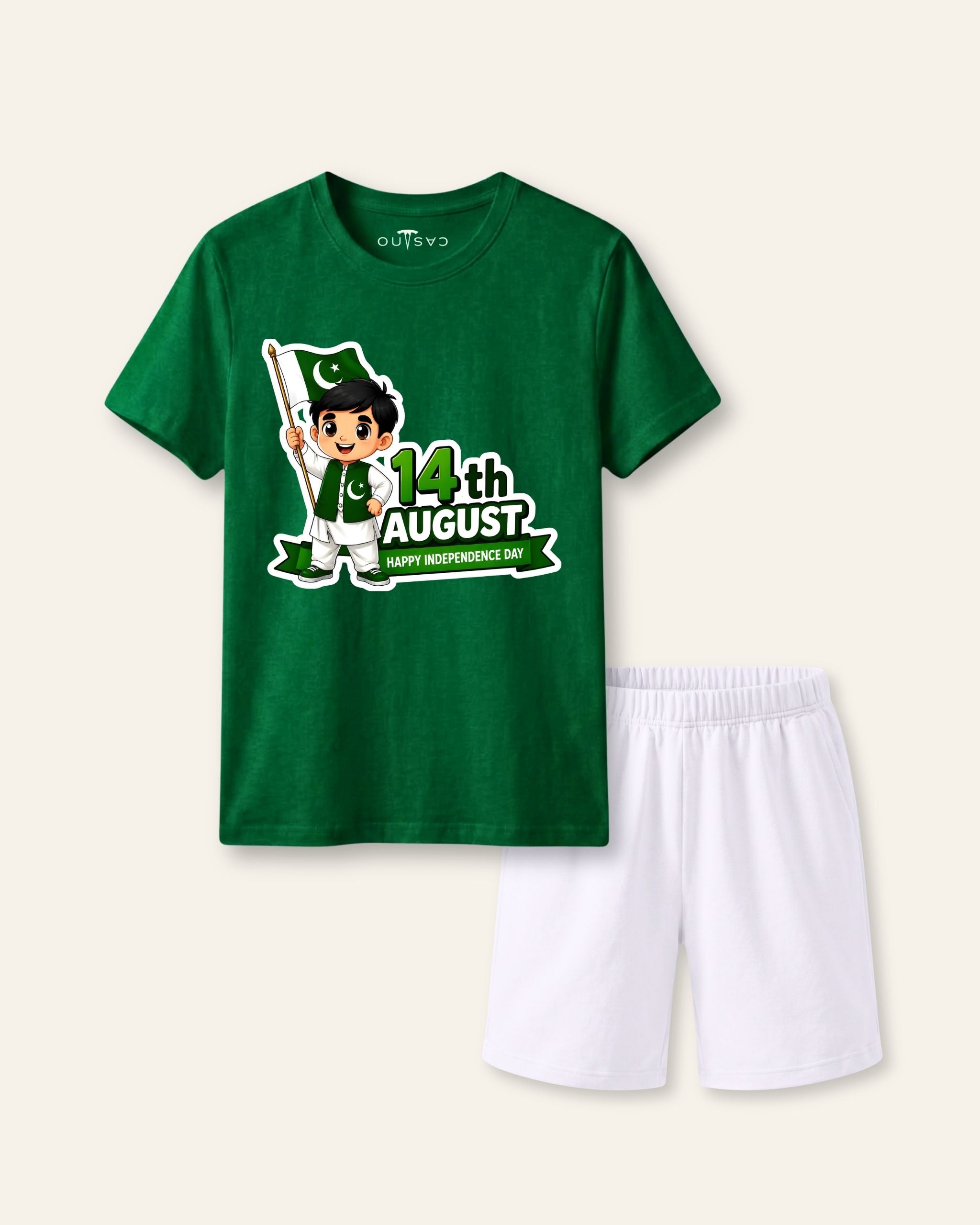 Kids green tee with a boy holding a flag beside a 14 August mark and white shorts