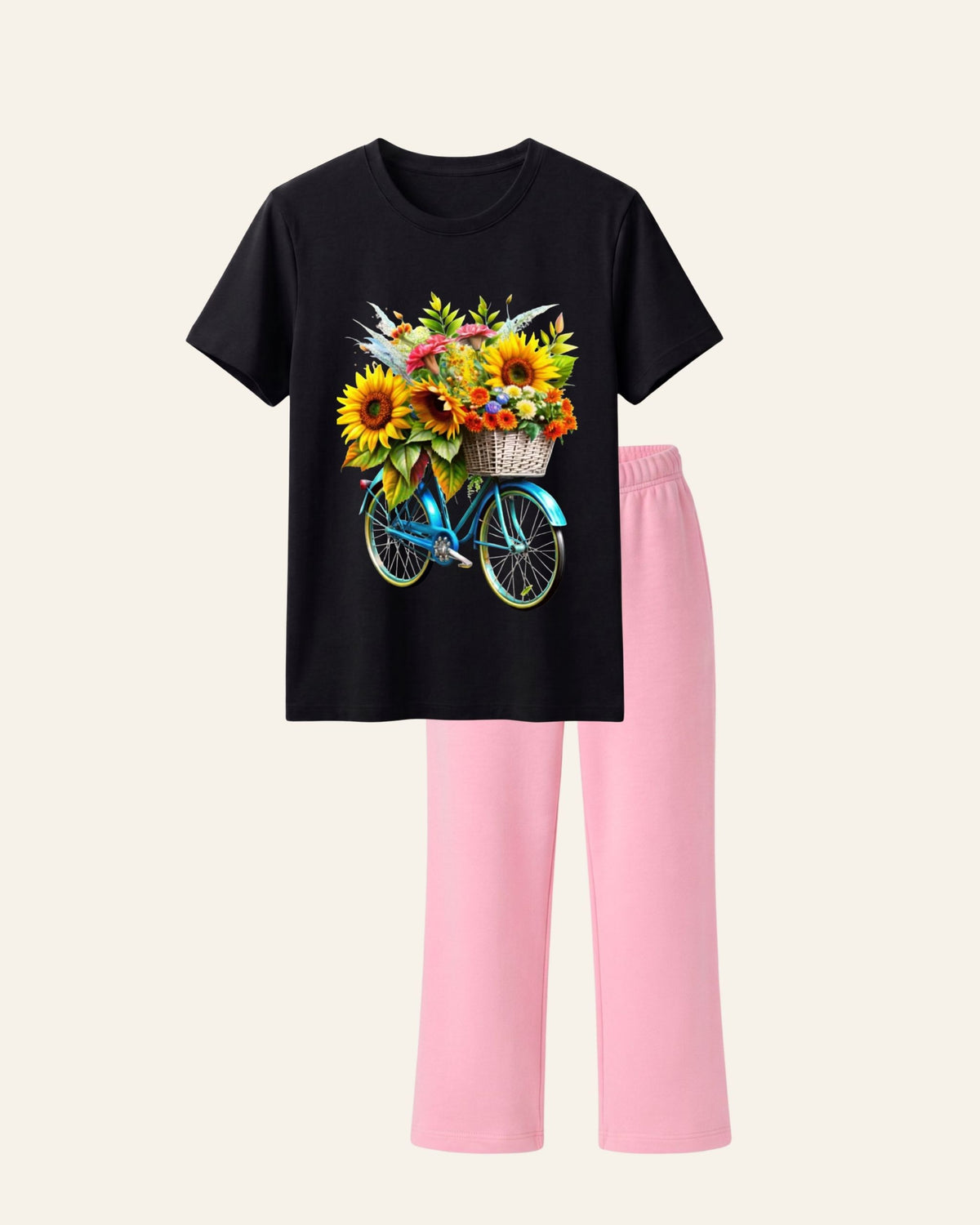 Black kids tee with a bicycle and sunflowers print and matching pink trousers