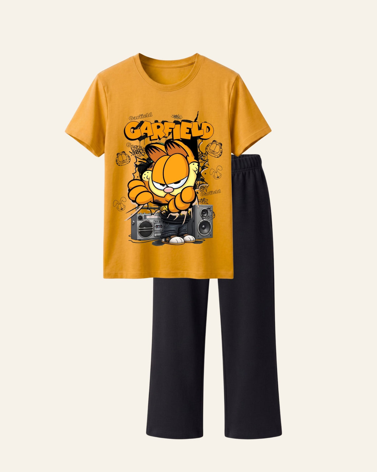 Mustard kids tee with a cartoon cat and speakers print and matching black trousers